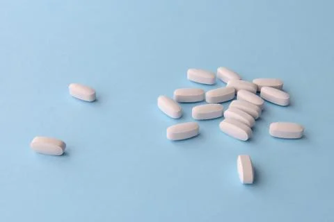White pills. Stock Photos