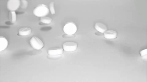 White pills scattered on the table Video stock 55821970