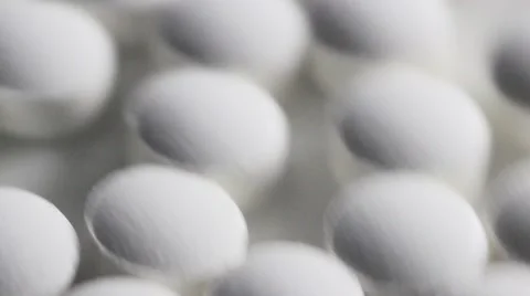 White Pills Spinning Towards Camera Stockbeeldmateriaal 66293325
