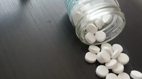 White Pills on the Table Stock Footage 40608685