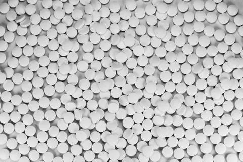 White pills, tablets on white background. 스톡 사진
