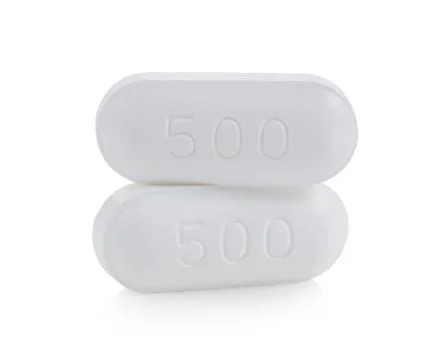 White pills  tablets on a white background. full depth of field Stock Photos