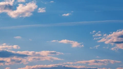 White-Pink Clouds &amp; Blue Sky. Stock Footage 76445943