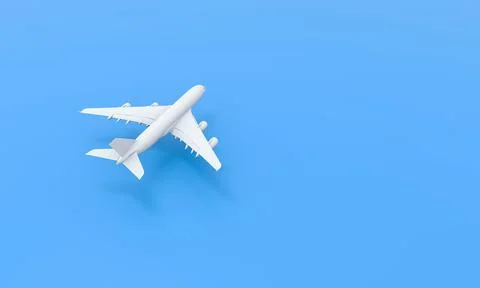 White plane on blue background. Stock Photos