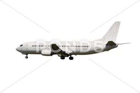 White plane landing in sunny day Stock Photos