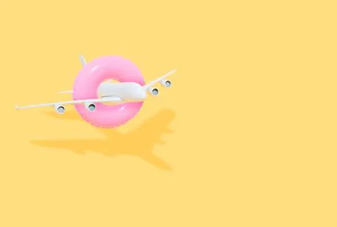 White plane with a pink float on a yellow background. Concept of travel and s Stock Photos