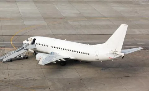 White plane on the platform Stock Photos