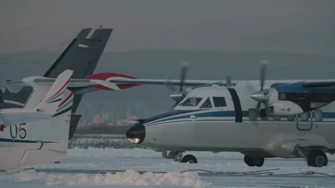 White plane with propellers preparing for take-off Видео 128582393