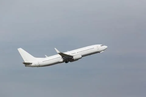 White plane takes off Stock Photos