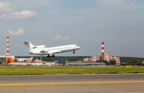 White plane takes off Stock Photos