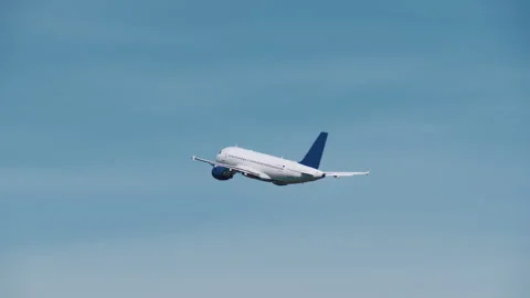 White plane took off in the blue sky Stock Footage 92199221