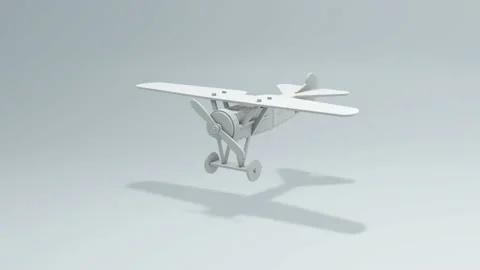 The White Plane Toy With Spinning Propeller Rotates Around its Axis. Stock Footage 200836115