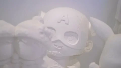 White plaster statues made by children in the children's entertainment area of t Stock Footage 157853613