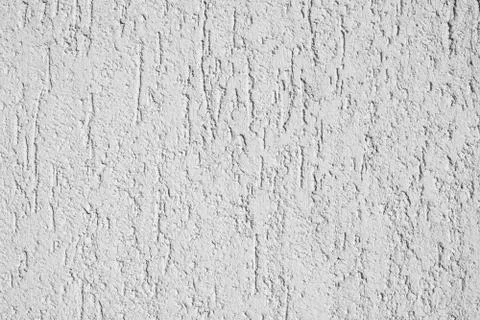 White plaster texture on an uneven surface Stock Photos