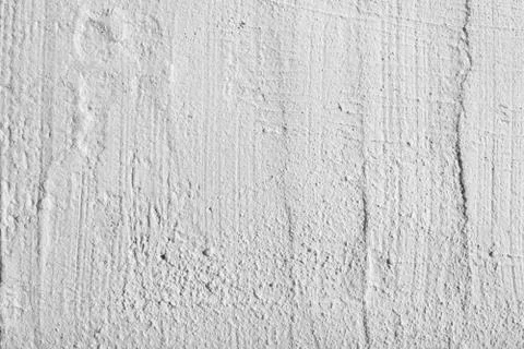 White plaster texture on an uneven surface Stock Photos