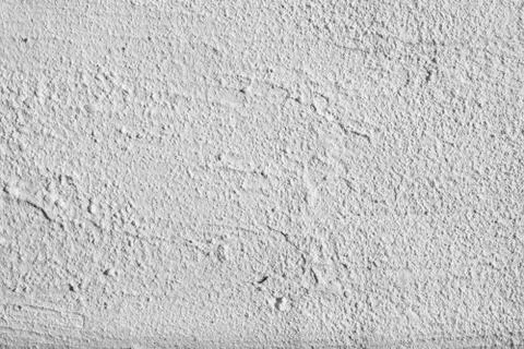 White plaster texture on an uneven surface Stock Photos