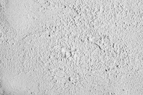 White plaster texture on an uneven surface Stock Photos