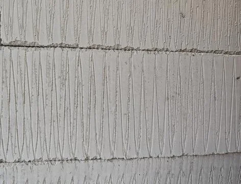 White Plaster Wall Texture With Linear Pattern Background Stock Photos