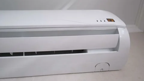White plastic air conditioner on the wall in the room Stock Footage 234200140