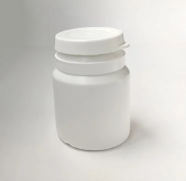 White plastic bottle isolated on white background Foto stock