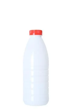 White plastic bottle with a red cap. White isolate. Stock Photos