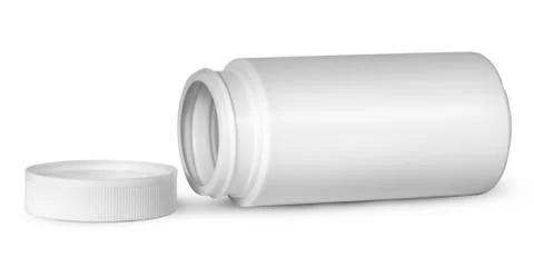 White plastic bottle for vitamins lying near lid Stock Photos
