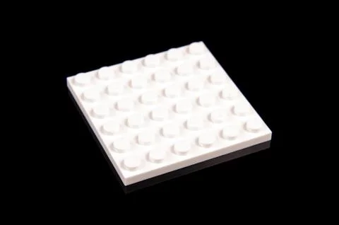 White plastic brick from toy constructor Stock Photos