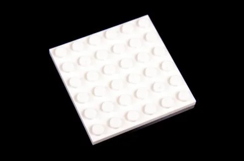 White plastic brick from toy constructor Stock Photos