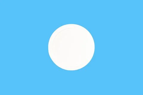 White plastic cap for jar isolated on blue, top view Stock Photos