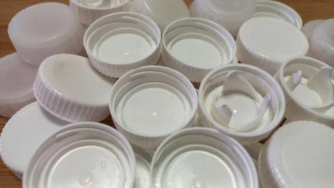 White Plastic Caps Stock Photos