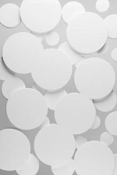 White plastic circles flying on soft light shining background as pattern, top Illustrazione stock