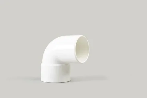 White plastic connection pipe on a gray background with copy space Stock Photos