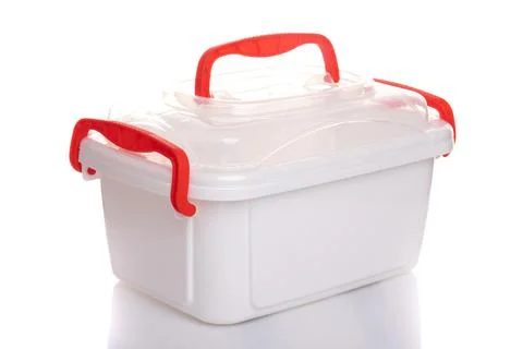 White plastic container with a red handle for lunch on a white isolated Photos