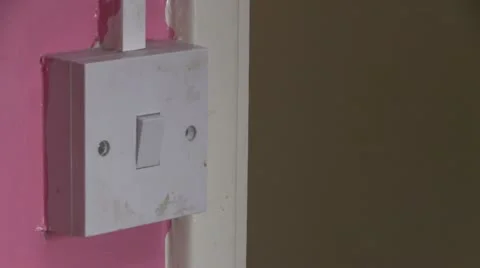 White plastic dirty light switch on off Stock Footage 22339631