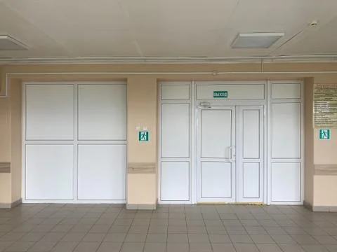 White plastic doors and stack panels in the hospital Foto stock