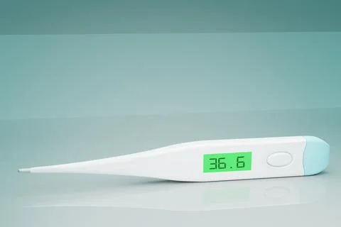 White, plastic electronic body thermometer that displays healthy body tempera Stock Illustration