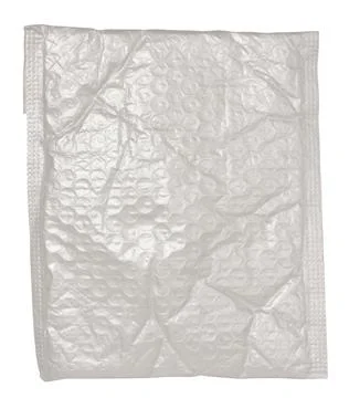 White plastic envelope with bubble wrap for correspondence on a white backg.. Stock Photos