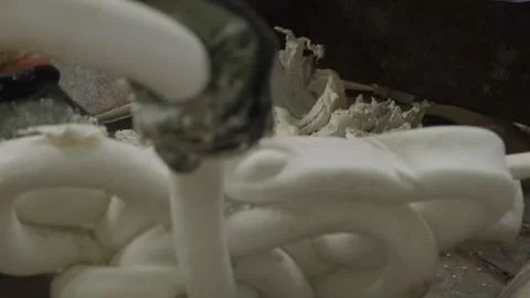 White Plastic Foam Chunks On Metal Grate In Recycling Facility Stock Footage 337913272
