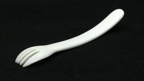 White plastic fork isolated Stock Photos