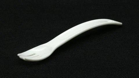 White plastic fork isolated Stock Photos