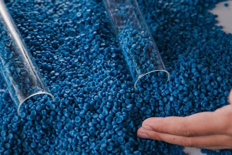 White plastic grain, plastic polymer granules,hand hold Polymer pellets, Ra.. 写真素材