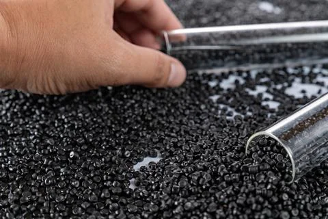White plastic grain, plastic polymer granules,hand hold Polymer pellets, Ra.. 写真素材