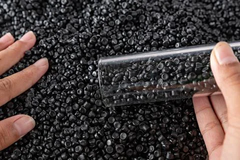 White plastic grain, plastic polymer granules,hand hold Polymer pellets, Ra.. 写真素材