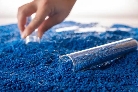 White plastic grain, plastic polymer granules,hand hold Polymer pellets, Ra.. 写真素材