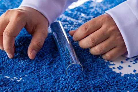 White plastic grain, plastic polymer granules,hand hold Polymer pellets, Ra.. 写真素材