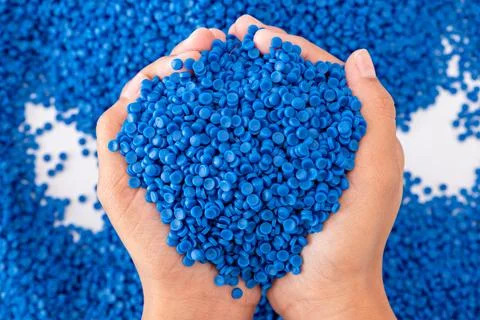 White plastic grain, plastic polymer granules,hand hold Polymer pellets, Ra.. 写真素材