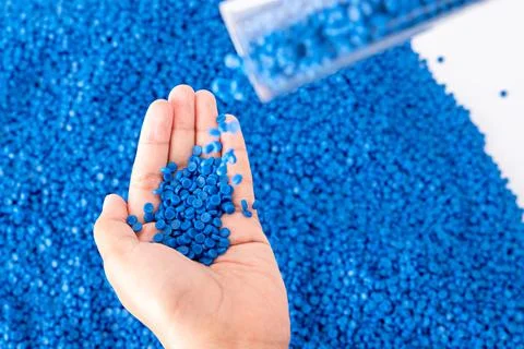 White plastic grain, plastic polymer granules,hand hold Polymer pellets, Ra.. 写真素材