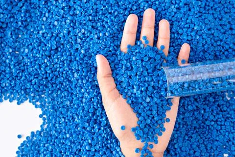 White plastic grain, plastic polymer granules,hand hold Polymer pellets, Ra.. 写真素材