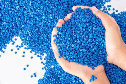 White plastic grain, plastic polymer granules,hand hold Polymer pellets, Ra.. 写真素材