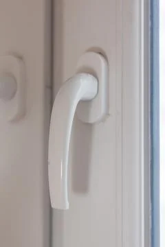 White Plastic Handle On Plastic Window Photos